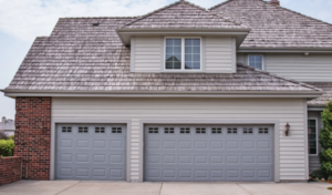 raised panel style garage doors colored gray