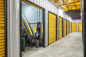 A series of yellow commercial garage doors 